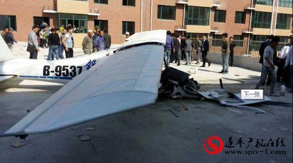 沈阳一小型飞机坠落 飞行员1死1伤(图)